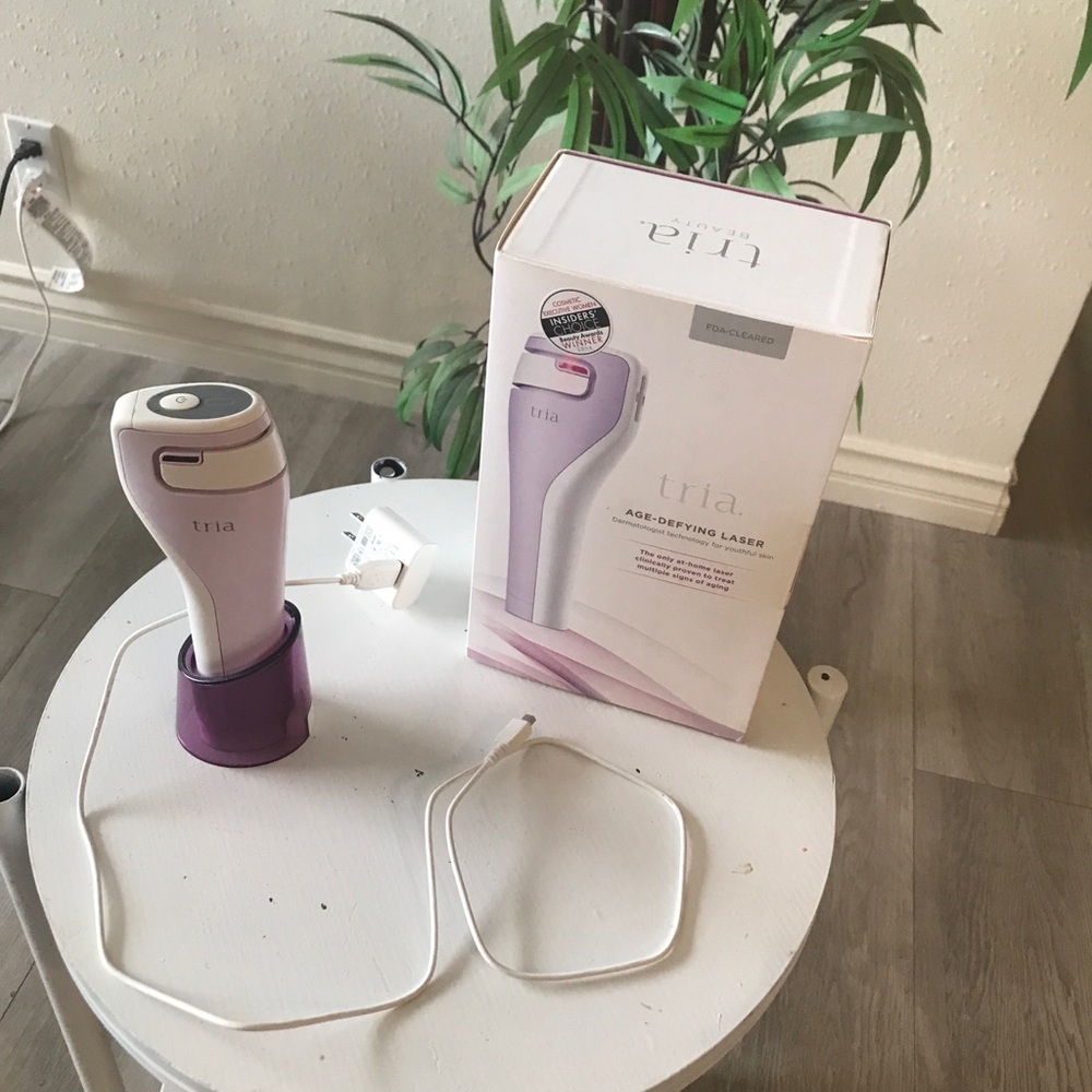 Tria Age Defying Laser With Charging Cradle and Power Supply